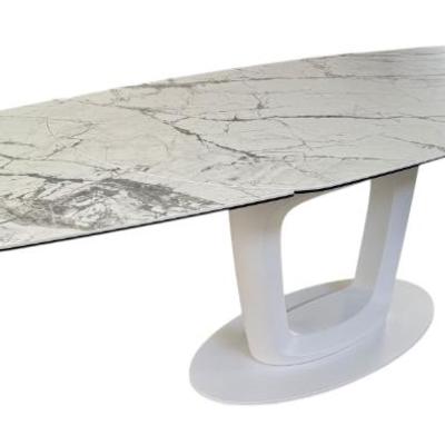 Calligaris Orbital Modern Extendable Dining Table with White Marble Ceramic Top. Dimensions closed: 64 in (L) x 39 in (W) x 29 5/8 in...