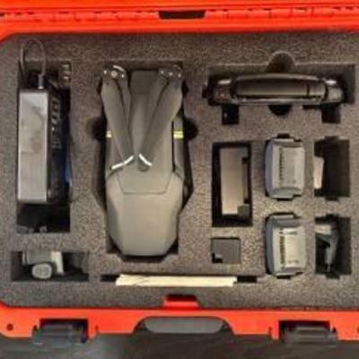 DJI Mavic Pro Drone. This set includes a DJI Mavic Pro drone, securely stored in a durable orange Nanuk 920 hard case. The Nanuk 920 case...