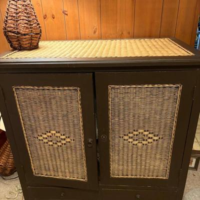 Wicker storage cabinet