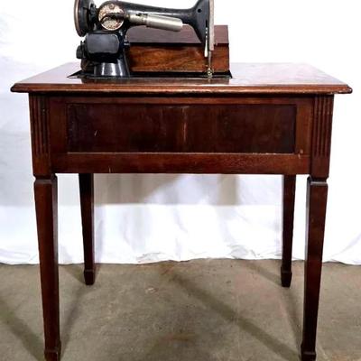 "Singer" Sewing Machine with Cabinet 