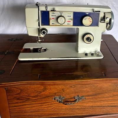 Vintage “Dressmaker” Sewing Machine and Cabinet 