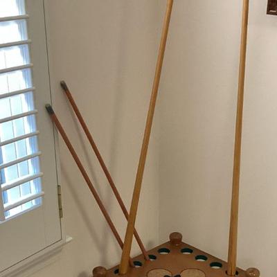Sale Photo Thumbnail #219: Pool cues and holder