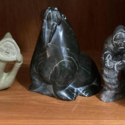 Sale Photo Thumbnail #58: Eskimo soapstone carvings and handwoven coiled gress basket