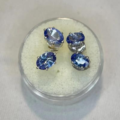 Two Pairs Sterling And Tanzanite Stud Earrings