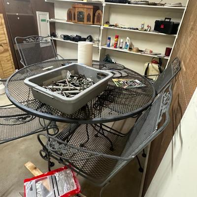 Sale Photo Thumbnail #298: wrought iron table and four chairs