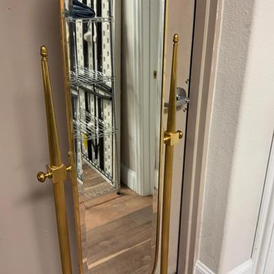 525: 63” Oval Brass Swivel Mirror