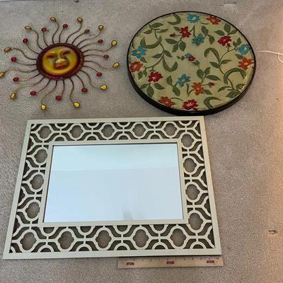 Three Pieces Of Decor Including A Mirror 