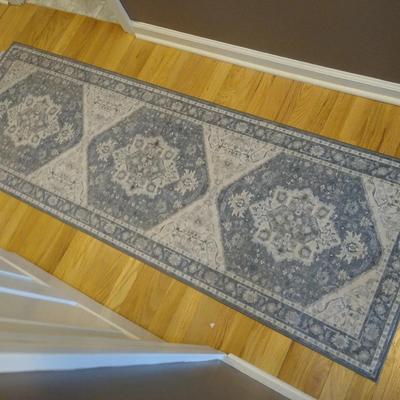 Light gray runner rug