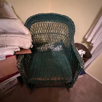 Green wicker armchair
