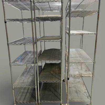 Three Over 6 Feet Tall Metal Shelves On Wheels 