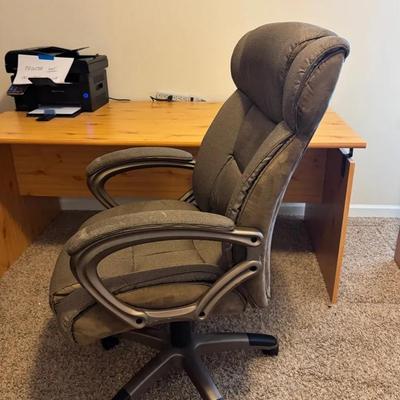 Office Desk And Swivel Chair And Wall Clock And A Chest Of Drawers 