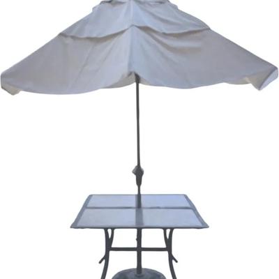 Metal, tile topped patio table & umbrella