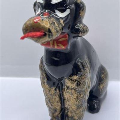 Lot 079 
Vintage Black Poodle Dog Pin Cushion Tape Measure