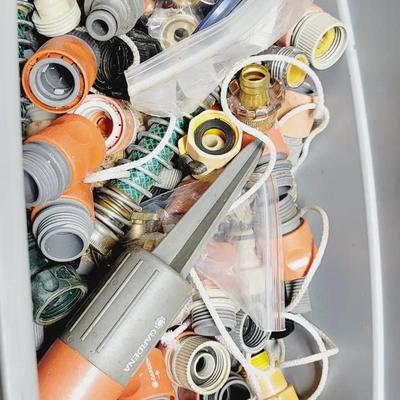Small Tote Of Garden Hose Connectors For Garden Or Greenhouse 