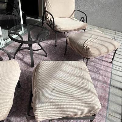 4-Piece Patio Seating Set with Rug, Cushioned Chairs, Ottomans & Glass-Top Table