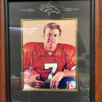 Framed signed photograph of John Elway in Denver Broncos uniform