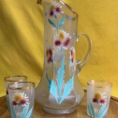 Victorian enameled glass lemonade pitcher and 3 matching tumblers.