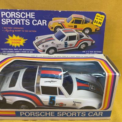 Vintage Battery-Operated Porsche Sports Car Toy w/ Box – Bump ’N Go Action + Sound (Martini Style)