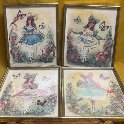 Set of four framed "big eye" art prints by M. Hartnett