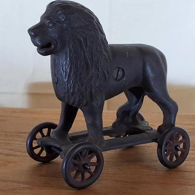 Vintage Cast Iron Lion on Wheels Still Bank