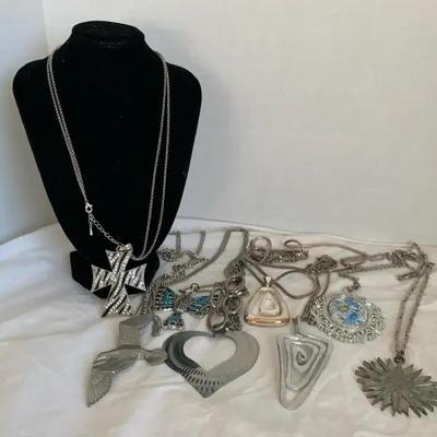 Silvertone Necklaces With Larges Pendants
