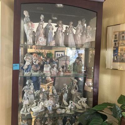 Lladro collection (Curio cabinet not for sale)