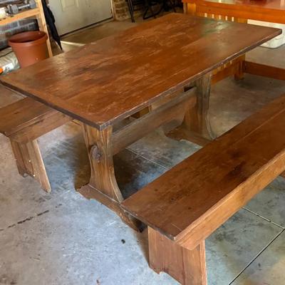 Rustic farmhouse dining table with benches