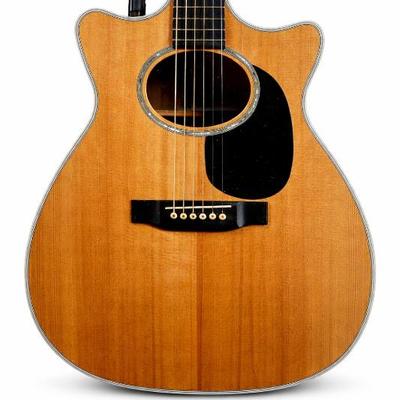 Martin Guitar M2C - 28 : Only 22 of these were made. 20 for the U.S.A.

This is in  mint condition . In fact, it should be considered NEW...