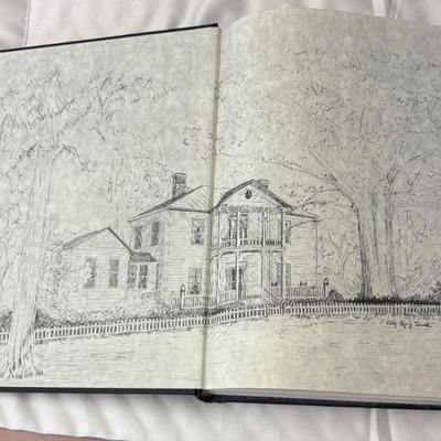 Decorative red leather-bound book with gilt tooling