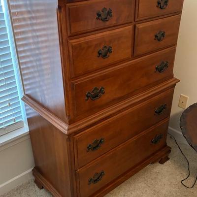 Wooden Chest-on-Chest Dresser

Appears to be a traditional wooden chest-on-chest dresser with multiple drawers, likely maple or cherry...