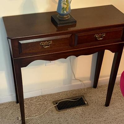Wood console table with drawers, traditional style, brass pulls, appears solid wood