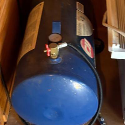 Portable air compressor tank, blue, appears Craftsman