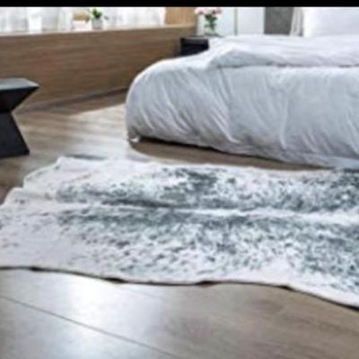 Sale Photo Thumbnail #192: Cow rug 6x7 (2 available /other is tan solid)