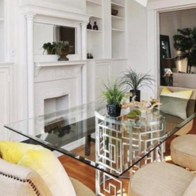 Sale Photo Thumbnail #75: Silver trellis dining table with glass top 
-Mid century linen nail head dining chairs
-Options for round 38-40” diameter  
-Options for rectangle as shown 6’  
