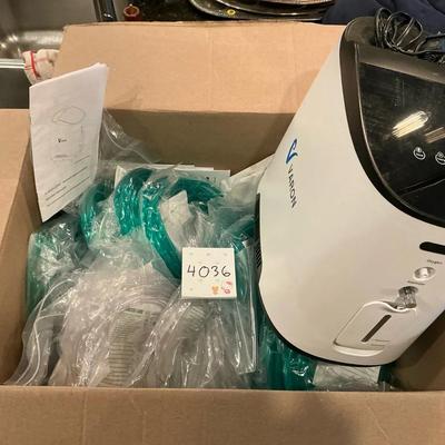 Varon Home, Oxygen Concentrator And Box Of Supplies
