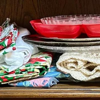 BO126 Tablecloths, Placemats, Platters And Basket Of Holiday Napkins