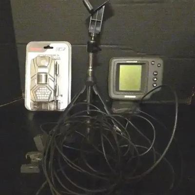 Humminbird Fishfinder, Tasco Trail Camera, and Adjustable Phone Tripod Collection