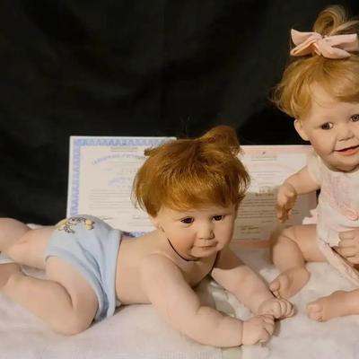 Ashton-Drake Galleries Porcelain Baby Dolls, featuring “Cute as a Button” & “Snug as a Bug in a Rug”
