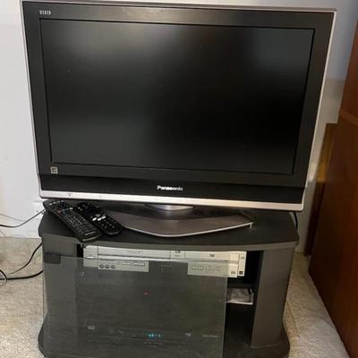 PPM029 Panasonic 26” TV, Panasonic VHS/DVD Player , Cisco Cable Box & Media Stand