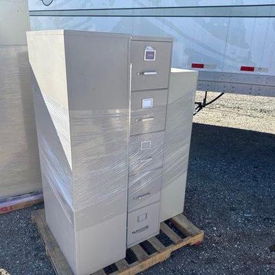 76004 • three metal file cabinets