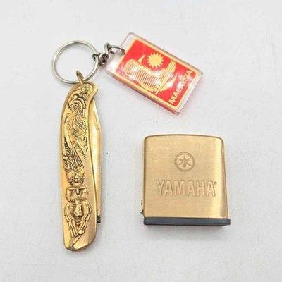 1900 • yamaha zippo tape measure & pocket knife