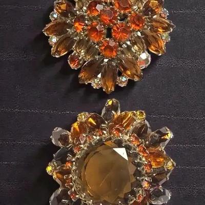 Rhinestone domed brooches in orange brown