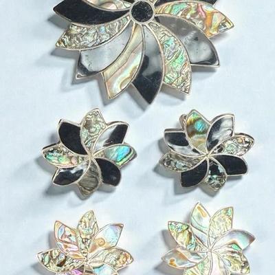 Mexican sterling pinwheel brooch with abalone black onyx