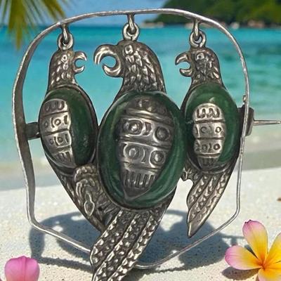 Sterling silver three parrot brooch with green gemstone inlay