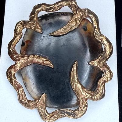 Metal wrapped agate brooch mexico