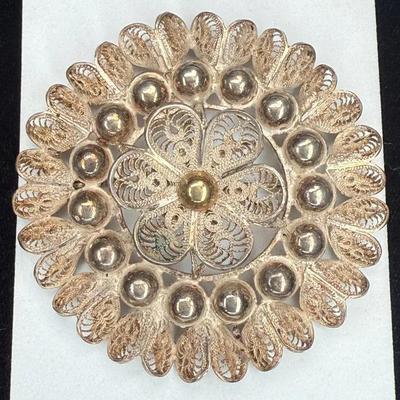 Filigree floral brooch stamped made in mexico"