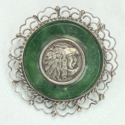 Sterling brooch with profile of native american