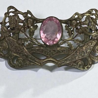 Art nouveau sash pin with a large pink center stone
