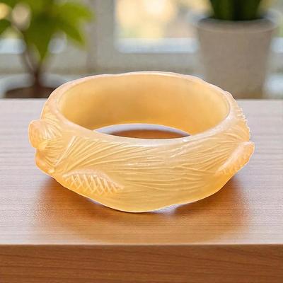 Apple juice" celluloid carved bangle bracelet