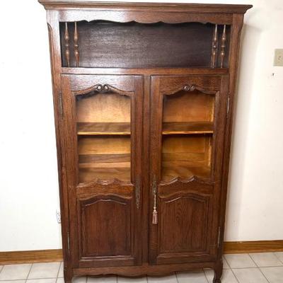 Antique Hand Carved Oak China Cabinet with Glass Doors and Adjustable Shelves